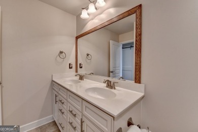 Nestled in a serene cul-de-sac, this meticulously maintained on Reunion Golf Club in Georgia - for sale on GolfHomes.com, golf home, golf lot