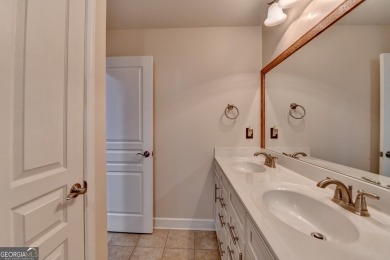 Nestled in a serene cul-de-sac, this meticulously maintained on Reunion Golf Club in Georgia - for sale on GolfHomes.com, golf home, golf lot