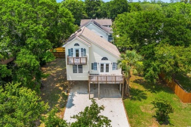 Welcome to 154 Cedar Point Avenue, a classic raised beach home on Wachesaw Plantation Club in South Carolina - for sale on GolfHomes.com, golf home, golf lot