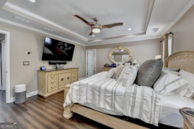 Nestled in a serene cul-de-sac, this meticulously maintained on Reunion Golf Club in Georgia - for sale on GolfHomes.com, golf home, golf lot