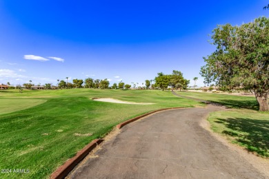 This beautiful home overlooks the 14th  Green on Pebblebrook on Stardust Golf Course in Arizona - for sale on GolfHomes.com, golf home, golf lot