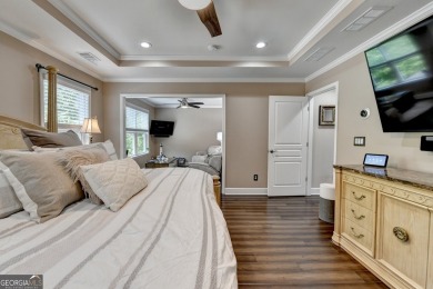 Nestled in a serene cul-de-sac, this meticulously maintained on Reunion Golf Club in Georgia - for sale on GolfHomes.com, golf home, golf lot