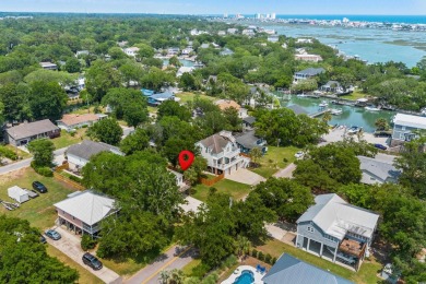 Welcome to 154 Cedar Point Avenue, a classic raised beach home on Wachesaw Plantation Club in South Carolina - for sale on GolfHomes.com, golf home, golf lot