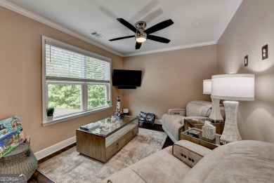Nestled in a serene cul-de-sac, this meticulously maintained on Reunion Golf Club in Georgia - for sale on GolfHomes.com, golf home, golf lot