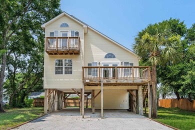 Welcome to 154 Cedar Point Avenue, a classic raised beach home on Wachesaw Plantation Club in South Carolina - for sale on GolfHomes.com, golf home, golf lot