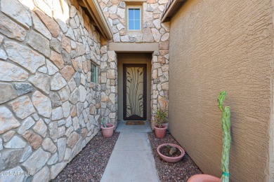 Welcome to this beautifully designed 4-bedroom, 2-bathroom on Estrella Mountain Ranch Golf Course in Arizona - for sale on GolfHomes.com, golf home, golf lot