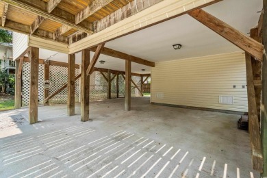 Welcome to 154 Cedar Point Avenue, a classic raised beach home on Wachesaw Plantation Club in South Carolina - for sale on GolfHomes.com, golf home, golf lot