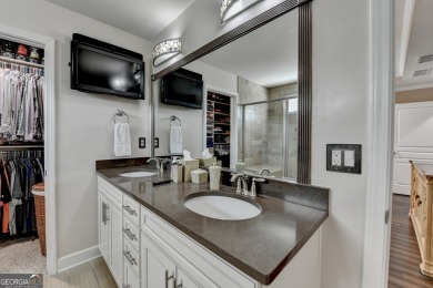 Nestled in a serene cul-de-sac, this meticulously maintained on Reunion Golf Club in Georgia - for sale on GolfHomes.com, golf home, golf lot