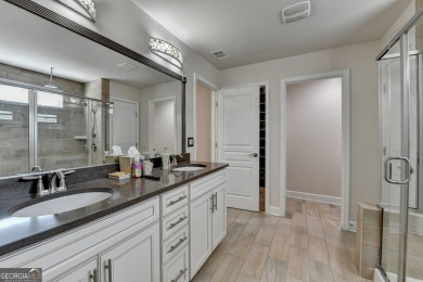 Nestled in a serene cul-de-sac, this meticulously maintained on Reunion Golf Club in Georgia - for sale on GolfHomes.com, golf home, golf lot