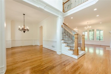 EXPERIENCE THE PINNACLE OF LUXURY LIVING IN THIS COMPETITIVELY on Manor Golf and Country Club in Georgia - for sale on GolfHomes.com, golf home, golf lot