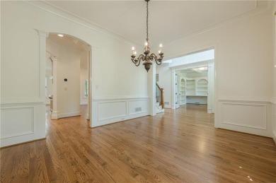 EXPERIENCE THE PINNACLE OF LUXURY LIVING IN THIS COMPETITIVELY on Manor Golf and Country Club in Georgia - for sale on GolfHomes.com, golf home, golf lot