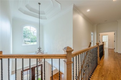 EXPERIENCE THE PINNACLE OF LUXURY LIVING IN THIS COMPETITIVELY on Manor Golf and Country Club in Georgia - for sale on GolfHomes.com, golf home, golf lot