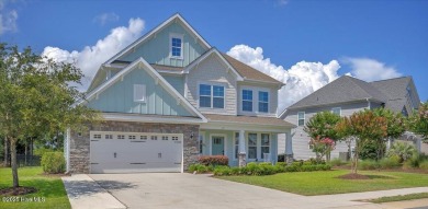 This two-story coastal craftsman style house is a rare on Beau Rivage Golf and Resort in North Carolina - for sale on GolfHomes.com, golf home, golf lot