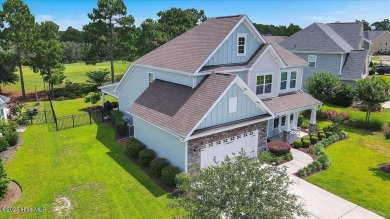 This two-story coastal craftsman style house is a rare on Beau Rivage Golf and Resort in North Carolina - for sale on GolfHomes.com, golf home, golf lot
