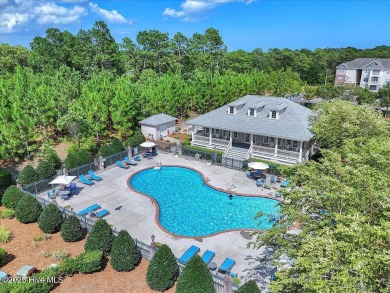 This two-story coastal craftsman style house is a rare on Beau Rivage Golf and Resort in North Carolina - for sale on GolfHomes.com, golf home, golf lot