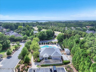This two-story coastal craftsman style house is a rare on Beau Rivage Golf and Resort in North Carolina - for sale on GolfHomes.com, golf home, golf lot