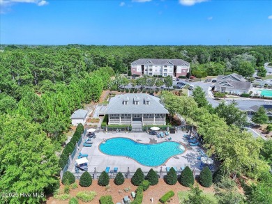 This two-story coastal craftsman style house is a rare on Beau Rivage Golf and Resort in North Carolina - for sale on GolfHomes.com, golf home, golf lot