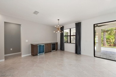 This upgraded 2023 Pulte Summerwood floor plan features an on River Hall Country Club in Florida - for sale on GolfHomes.com, golf home, golf lot