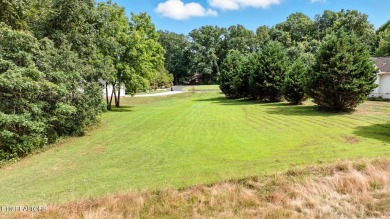 Welcome home to 113 Tigitsi Trace. This is a rare opportunity to on Toqua Golf Course - Loudon County in Tennessee - for sale on GolfHomes.com, golf home, golf lot