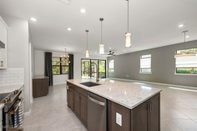 This upgraded 2023 Pulte Summerwood floor plan features an on River Hall Country Club in Florida - for sale on GolfHomes.com, golf home, golf lot
