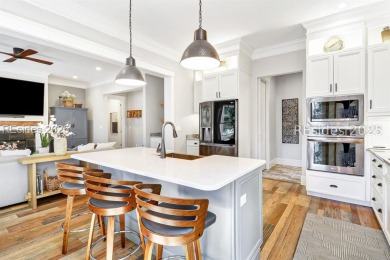 Built in 2018, this stunning home is perfectly situated on a on Oldfield Golf Club in South Carolina - for sale on GolfHomes.com, golf home, golf lot
