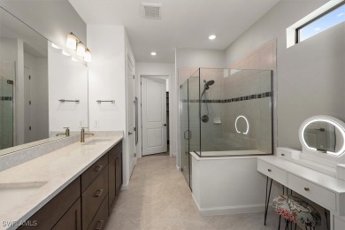 This upgraded 2023 Pulte Summerwood floor plan features an on River Hall Country Club in Florida - for sale on GolfHomes.com, golf home, golf lot