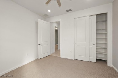 This upgraded 2023 Pulte Summerwood floor plan features an on River Hall Country Club in Florida - for sale on GolfHomes.com, golf home, golf lot