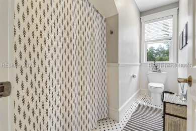 Built in 2018, this stunning home is perfectly situated on a on Oldfield Golf Club in South Carolina - for sale on GolfHomes.com, golf home, golf lot