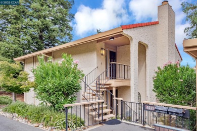You'll love the two spacious balconies offering fantastic golf on Rossmoor Golf Course in California - for sale on GolfHomes.com, golf home, golf lot