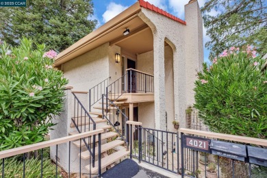 You'll love the two spacious balconies offering fantastic golf on Rossmoor Golf Course in California - for sale on GolfHomes.com, golf home, golf lot