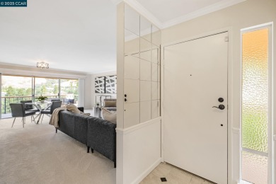 You'll love the two spacious balconies offering fantastic golf on Rossmoor Golf Course in California - for sale on GolfHomes.com, golf home, golf lot