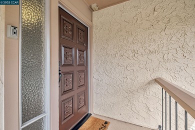 You'll love the two spacious balconies offering fantastic golf on Rossmoor Golf Course in California - for sale on GolfHomes.com, golf home, golf lot