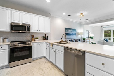 Enjoy $70K+ of recent upgrades in this bright, airy townhome on Charleston National Golf Club in South Carolina - for sale on GolfHomes.com, golf home, golf lot