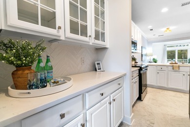 Enjoy $70K+ of recent upgrades in this bright, airy townhome on Charleston National Golf Club in South Carolina - for sale on GolfHomes.com, golf home, golf lot