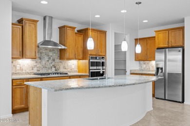 Embrace the vibrant Active Adult lifestyle in this beautifully on Poston Butte Golf Club in Arizona - for sale on GolfHomes.com, golf home, golf lot