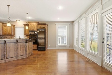 Nestled in the highly desirable Creekmoor community in Raymore on Golf Club of Creekmoor in Missouri - for sale on GolfHomes.com, golf home, golf lot