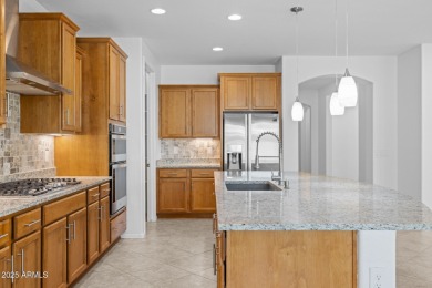 Embrace the vibrant Active Adult lifestyle in this beautifully on Poston Butte Golf Club in Arizona - for sale on GolfHomes.com, golf home, golf lot