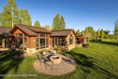 Located in the sought-after Jackson Hole Golf & Tennis community on Jackson Hole Golf and Tennis Club in Wyoming - for sale on GolfHomes.com, golf home, golf lot