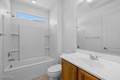 Embrace the vibrant Active Adult lifestyle in this beautifully on Poston Butte Golf Club in Arizona - for sale on GolfHomes.com, golf home, golf lot