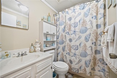 Discover easy, low-maintenance coastal living, perfectly priced on Red Wing Lake Golf Course in Virginia - for sale on GolfHomes.com, golf home, golf lot