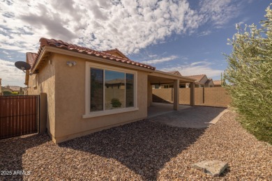 Embrace the vibrant Active Adult lifestyle in this beautifully on Poston Butte Golf Club in Arizona - for sale on GolfHomes.com, golf home, golf lot