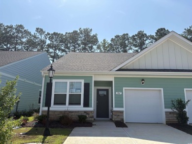 This home has 2 bedrooms and a flex room with french doors on Brunswick Plantation and Golf Resorts in North Carolina - for sale on GolfHomes.com, golf home, golf lot