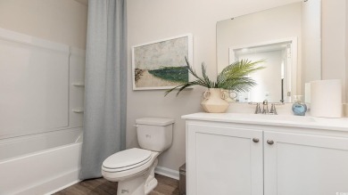 This home has 2 bedrooms and a flex room with french doors on Brunswick Plantation and Golf Resorts in North Carolina - for sale on GolfHomes.com, golf home, golf lot
