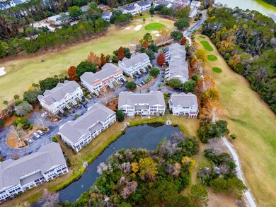 Enjoy $70K+ of recent upgrades in this bright, airy townhome on Charleston National Golf Club in South Carolina - for sale on GolfHomes.com, golf home, golf lot