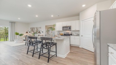 This home has 2 bedrooms and a flex room with french doors on Brunswick Plantation and Golf Resorts in North Carolina - for sale on GolfHomes.com, golf home, golf lot