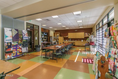 Embrace the vibrant Active Adult lifestyle in this beautifully on Poston Butte Golf Club in Arizona - for sale on GolfHomes.com, golf home, golf lot