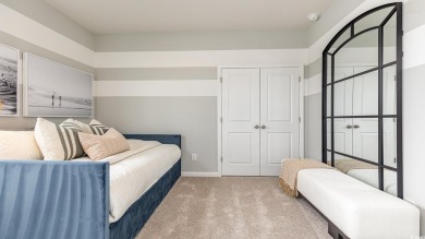 This home features 2 bedrooms and a flex room with french doors on Brunswick Plantation and Golf Resorts in North Carolina - for sale on GolfHomes.com, golf home, golf lot