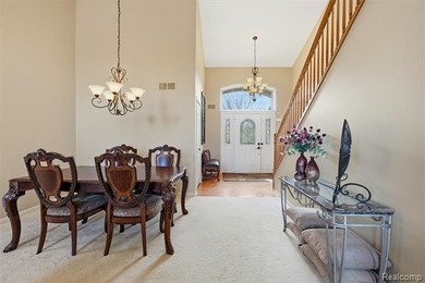 Spacious 3-bedroom, 3.5-bath, end-unit condo in the Villas at on Beacon Hill Golf Club in Michigan - for sale on GolfHomes.com, golf home, golf lot