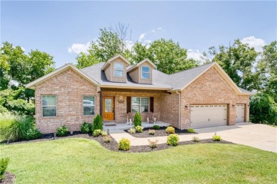 Welcome to your spacious retreat near Sugar Creek Golf Course! on Big Sugar Golf Club in Arkansas - for sale on GolfHomes.com, golf home, golf lot