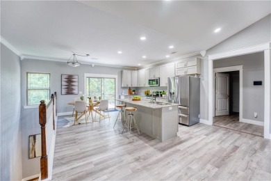 Welcome to your spacious retreat near Sugar Creek Golf Course! on Big Sugar Golf Club in Arkansas - for sale on GolfHomes.com, golf home, golf lot